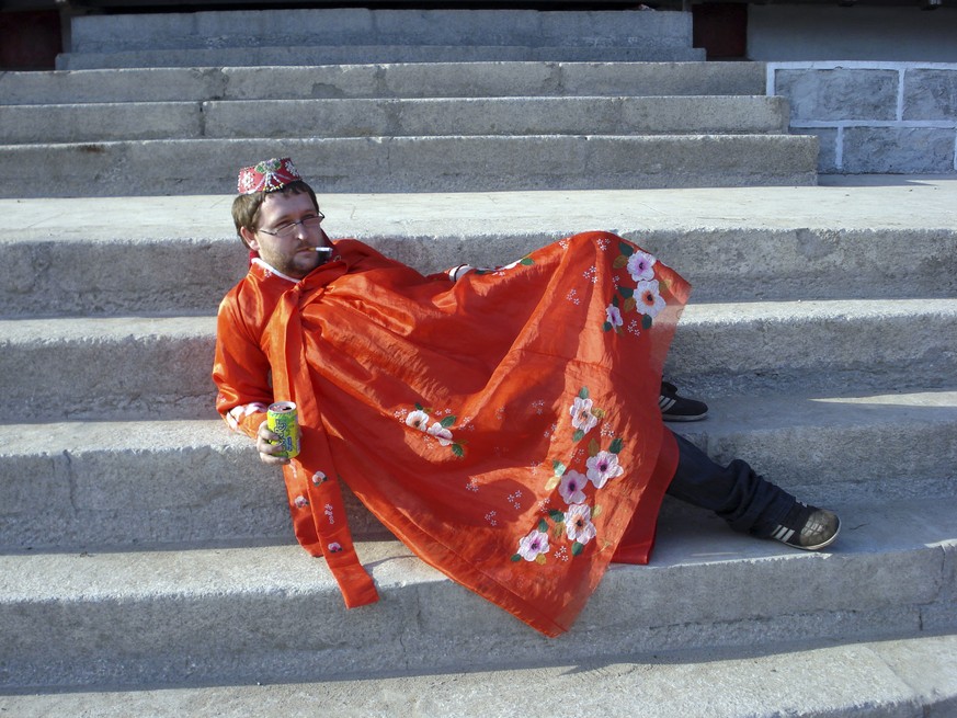 In this photo taken May 30, 2009 and released by Christopher Barbara, Gareth Johnson poses for photos while wearing a traditional costume during a visit to the Pyongyang Film Studio in Pyongyang in No ...