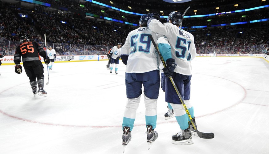 Sep 11, 2016; Montreal, Quebec, Canada; Team Europe forward Frans Nielsen (51) reacts with teammate Roman Josi (59) after scoring a goal against Team North America in the third period during a World C ...