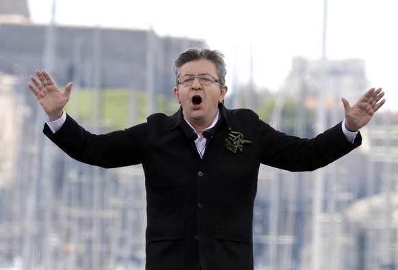 French hard-left presidential candidate, Jean-Luc Melenchon, speaks during a campaign rally in Marseille&#039;s Old Port, southern France, Sunday, April 9, 2017. The two-round presidential election is ...