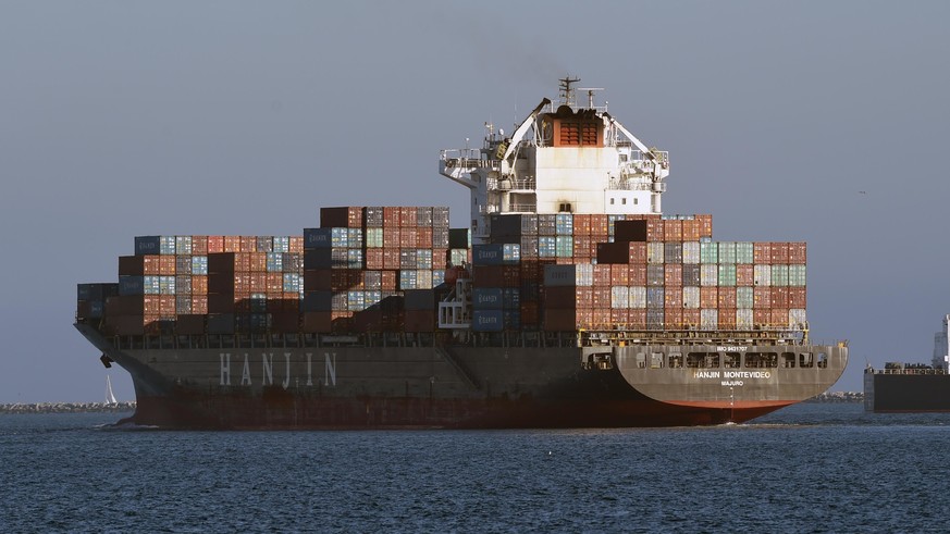 In this Wednesday, Aug. 31, 2016, photo, the container ship Hanjin Montevideo leaves the Hanjin Terminal and the Port of Long Beach in Long Beach, Calif. Hanjin has filed for bankruptcy and the ship H ...