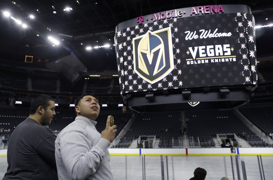 FILE - In this Nov. 22, 2016, file photo, people tour T-Mobile Arena during an event to unveil the name of Las Vegas&#039; National Hockey League franchise, in Las Vegas. The U.S. Patent and Trademark ...