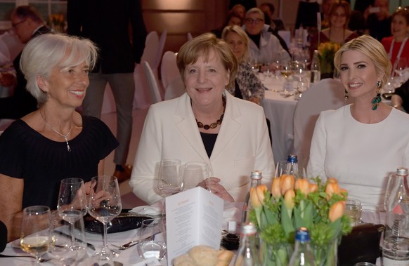 epa05927573 Managing Director of the International Monetary Fund (IMF) Christine Lagarde (L-R), German Chancellor Angela Merkel and US President Trump&#039;s assistant and daughter Ivanka Trump sit on ...