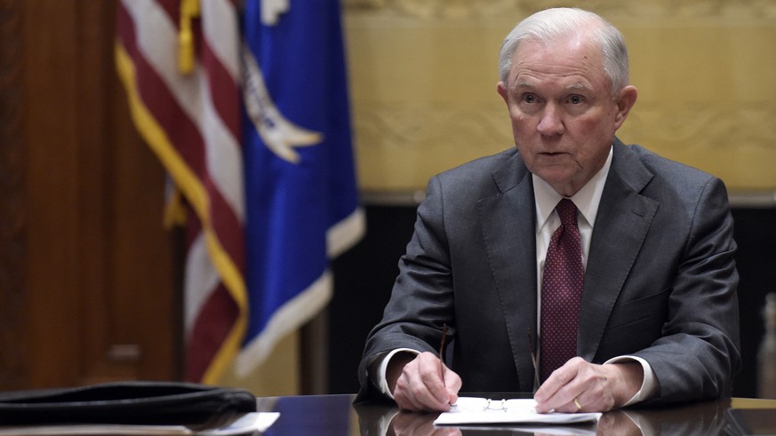 FILE - In this Feb. 9, 2017, file photo, Attorney General Jeff Sessions holds a meeting with the heads of federal law enforcement components at the Department of Justice in Washington. Sessions had tw ...