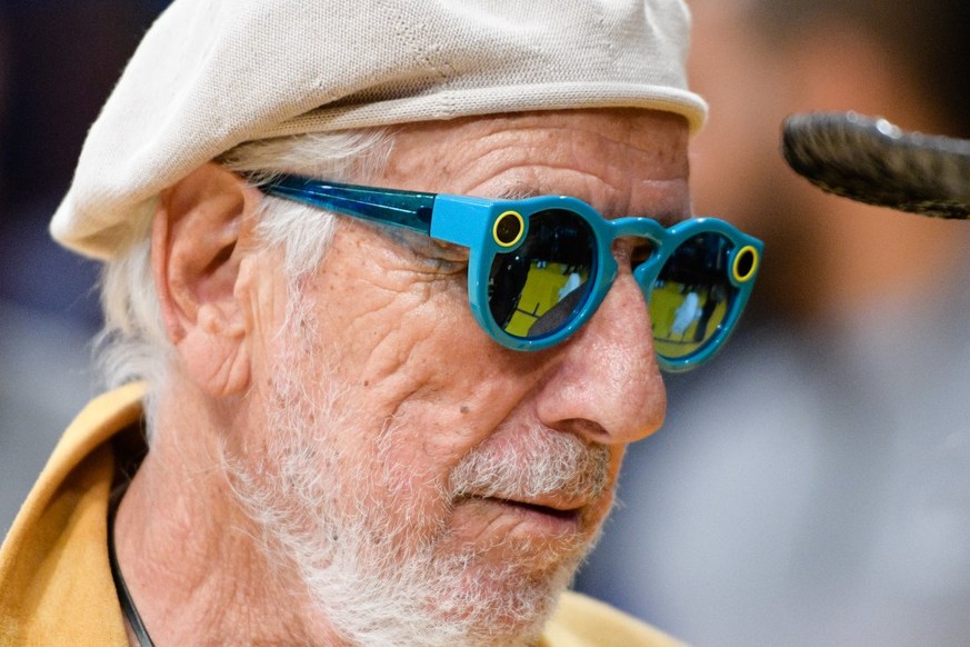 LOS ANGELES, CA - NOVEMBER 15: Lou Adler, wearing Snapchat&#039;s Spectacles, attends a basketball game between the Brooklyn Nets and the Los Angeles Lakers at Staples Center on November 15, 2016 in L ...