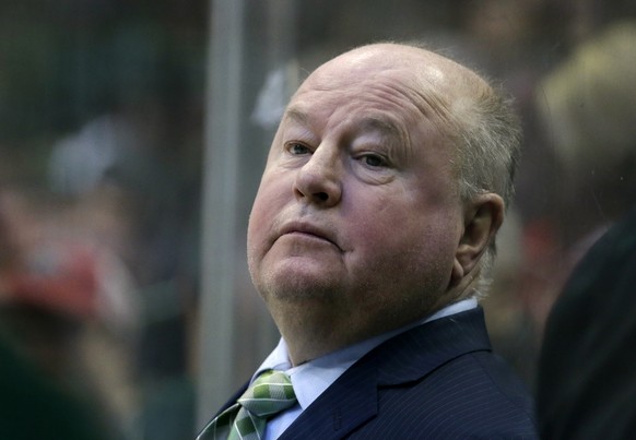 Minnesota Wild head coach Bruce Boudreau watches play against the Dallas Stars in the first period of an NHL hockey game in Dallas, Saturday Jan. 14, 2017. (AP Photo/LM Otero)