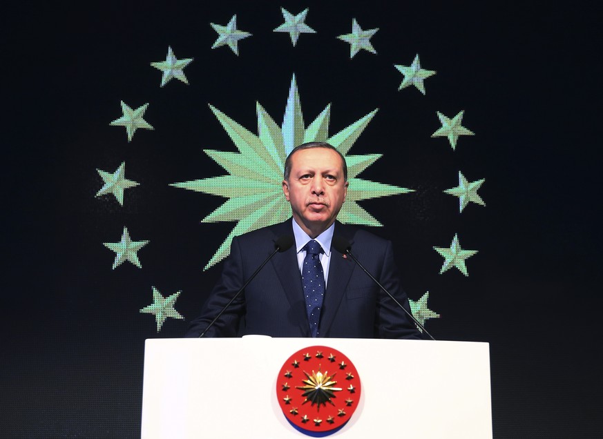 Turkey&#039;s President Recep Tayyip Erdogan delivers a speech during the opening of a new building for Istanbul&#039;s stock exchange, Saturday, Jan. 14, 2017. (Kayhan Ozer/Presidential Press Service ...