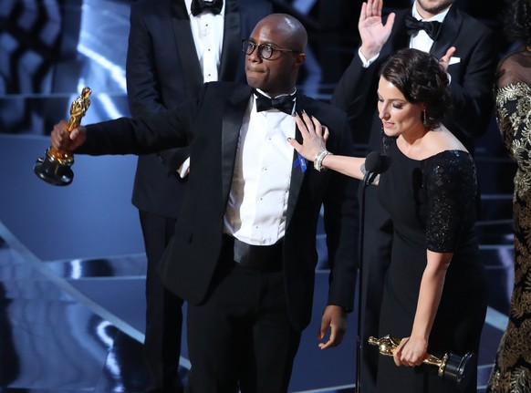 89th Academy Awards - Oscars Awards Show - Director Barry Jenkins and producer Adele Romanski celebrating the best picture win for &quot;Moonlight.&quot; REUTERS/Lucy Nicholson