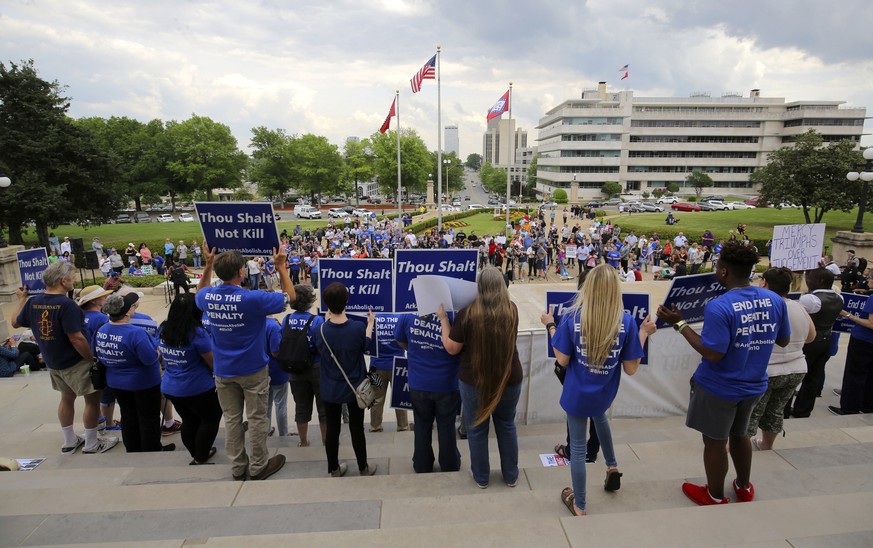 Crowds gather at a rally opposing Arkansas&#039; upcoming executions, which are set to begin next week, on the front steps of the Capitol Friday, April 14, 2017, in Little Rock, Ark. (Stephen B. Thorn ...