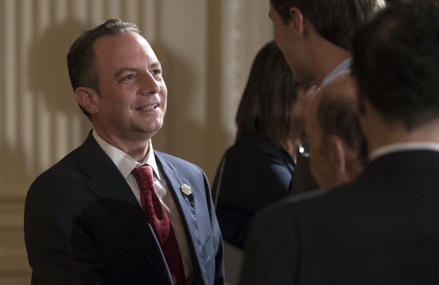 FILE - In this July 26, 2017 file photo, White House Chief of Staff Reince Priebus talks with White House senior adviser Jared Kushner in the East Room of the White House in Washington. New White Hous ...