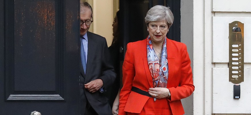 Britain&#039;s Prime Minister Theresa May leaves Conservative party headquarters in London, Friday, June 9, 2017. May&#039;s gamble in calling an early election appeared Friday to have backfired spect ...