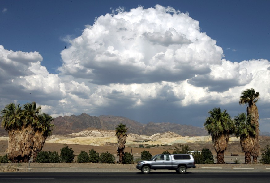FILE - This July 22, 2005 file photo shows clouds over the Amargosa Range at Furnace Creek in Death Valley National Park in California&#039;s Mojave Desert. Located about two hours west of Las Vegas a ...