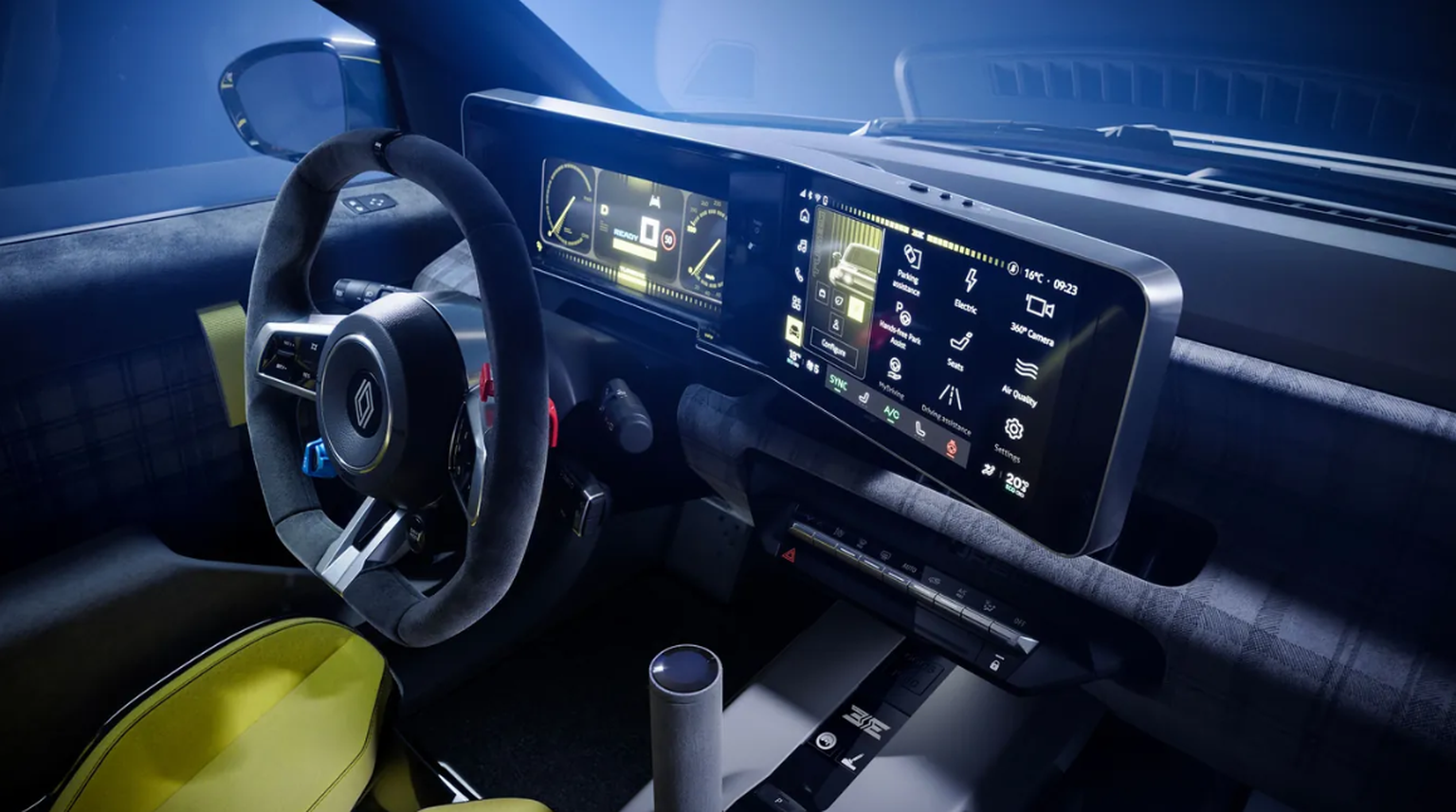Nachrichten Linkding Aufgemotzt: Das Serien-Cockpit des R5 wird durch das Lenkrad aus dem Alpine A290 und einen Driftknopf ergänzt – plus Bezüge im Rautenmuster.