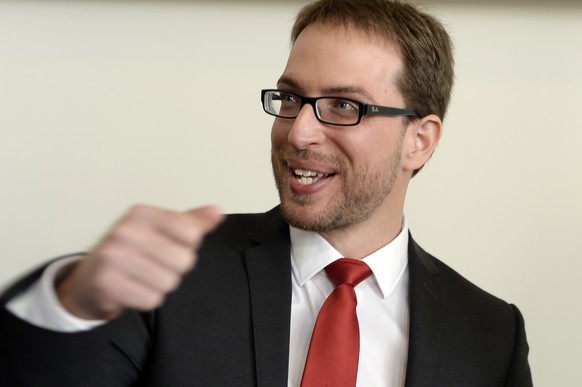 Daniel Frei, Praesident SP Kanto Zuerich, strahlt bei den Hochrechnungen der Nationalratswahlen im Wahlzentrum Walche in Zuerich am Sonntag, 18. Oktober 2015. (KEYSTONE/Walter Bieri)