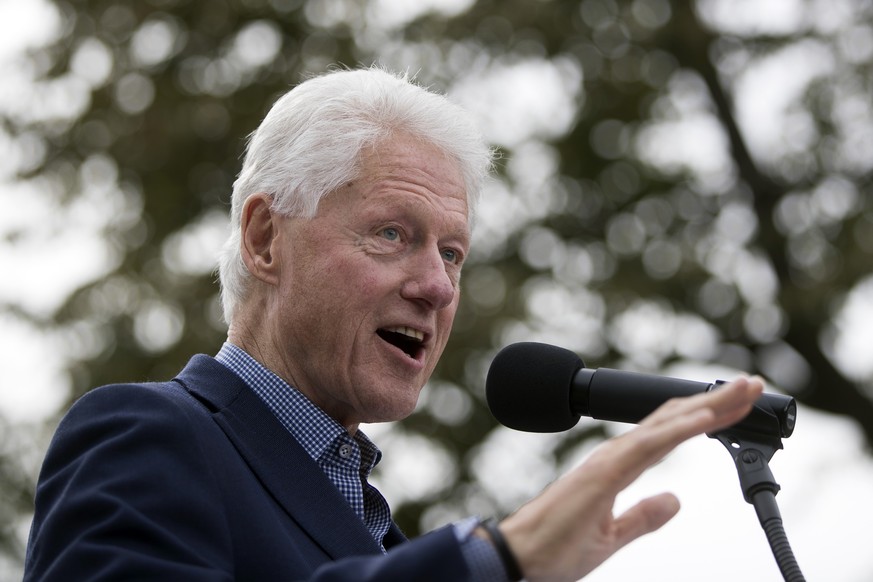 FILE - In this Oct. 14, 2016, file photo, former President Bill Clinton campaigns for his wife, Democratic presidential candidate Hillary Clinton, at Washington Park in Cincinnati. A 2011 confidential ...