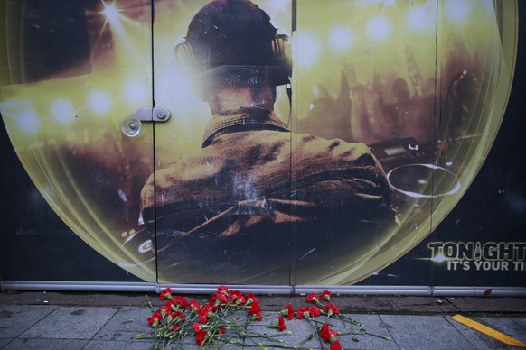 Flowers of the victims of the attack are placed outside a nightclub, which was attacked by a gunman overnight, in Istanbul, on New Year&#039;s Day, Sunday, Jan. 1, 2017. An assailant believed to have  ...