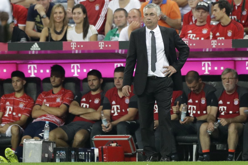 Bayern coach Carlo Ancelotti watches his team during the German Bundesliga soccer match between FC Bayern Munich and SV Werder Bremen at the Allianz Arena stadium in Munich, Germany, Friday, Aug. 26,  ...