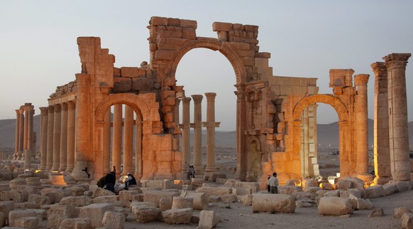 epa05669429 (FILE) A file picture dated 01 April 2016 shows damages near the Arch of Triumph in the ancient city of Palmyra in the central city of Homs, Syria. On 10 December 2016 Islamic State (IS) f ...