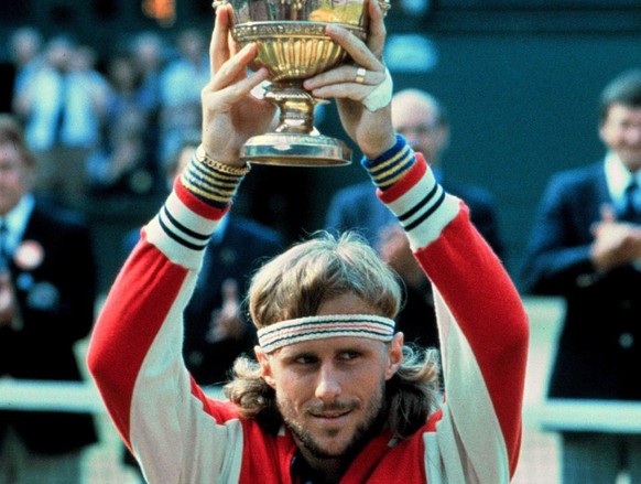 Photograph dated 07 July 1979 of Swedish tennis player Bjoern Borg holding the Wimbledon trophy. Swedish tennis great Bjorn Borg, winner of five consecutive Wimbledon titles, was slated to sell his fi ...