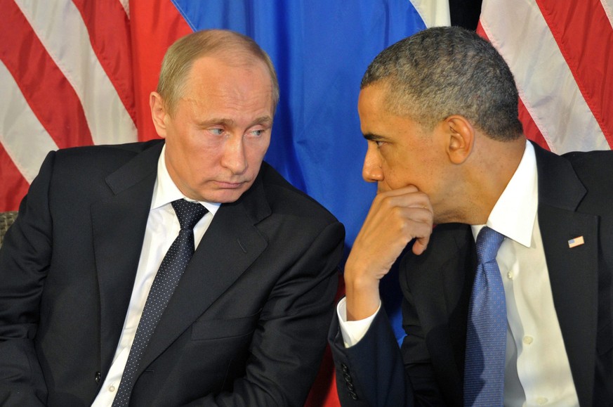 epa05691197 (FILE) - A file picture dated 18 June 2012 shows US President Barack Obama (R) talking with Russian President Vladimir Putin (L) during their meeting at Esperansa hotel prior G20 summit in ...