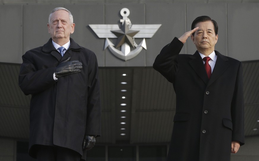 U.S. Defense Secretary Jim Mattis, left, and South Korean Defense Minister Han Min Koo salute during a welcome ceremony for Mattis at Defense Ministry in Seoul, South Korea, Friday, Feb. 3, 2017. (AP  ...