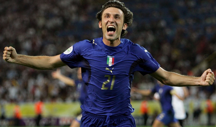 Italy&#039;s Andrea Pirlo celebrates his side&#039;s first goal by teammate Fabio Grosso in the extra time of the semifinal World Cup soccer match between Germany and Italy in Dortmund, Germany, Tuesd ...