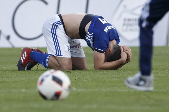 Lausanne&#039;s midfielder Olivier Custodio reacts after losing against Young Boys, during the Super League soccer match of Swiss Championship between FC Lausanne-Sport and BSC Young Boys, at the Stad ...