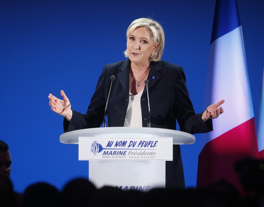 Far-right leader and candidate for the 2017 French presidential election, Marine Le Pen, addresses supporters after exit poll results of the first round of the presidential election were announced at  ...
