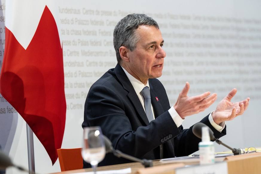 epa09791961 Swiss Federal President Ignazio Cassis speaks at a media conference to announce that Switzerland would follow the European Union (EU) in sanctioning Russia and freezing Russian assets, in  ...