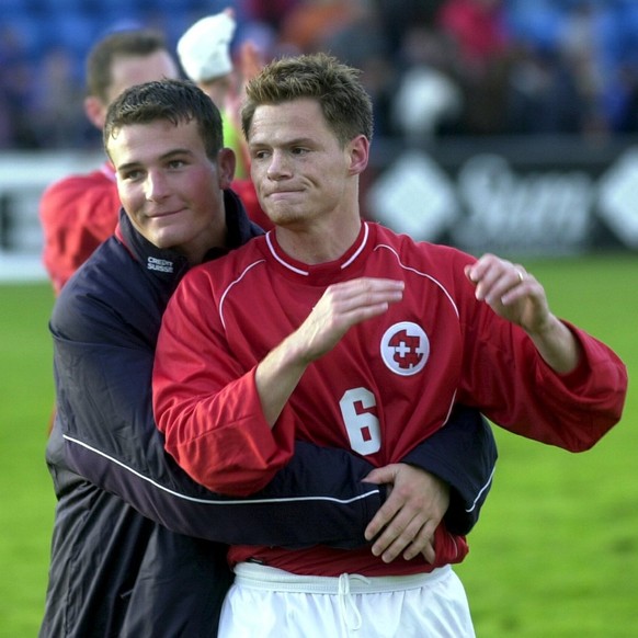 Switzerland&#039;s Alex Frei, left, and Johann Vogel, right, celebrate at the end of the game against Faroe Islands during the group 1 World championship qualification match in Toftir, Faroe Islands,  ...