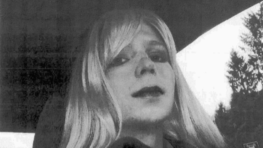 FILE - In this undated file photo provided by the U.S. Army, Pfc. Chelsea Manning poses for a photo wearing a wig and lipstick. Manning, the transgender soldier convicted in 2013 of illegally disclosi ...