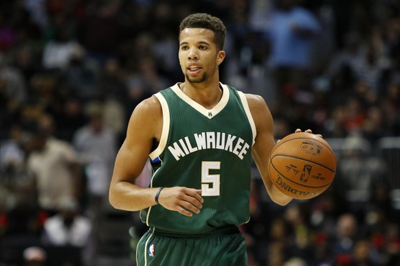 FILE - In this Feb. 20, 2016, file photo, Milwaukee Bucks guard Michael Carter-Williams (5) dribbles against the Atlanta Hawks in the second half of an NBA basketball game, in Atlanta. Point guard Mic ...