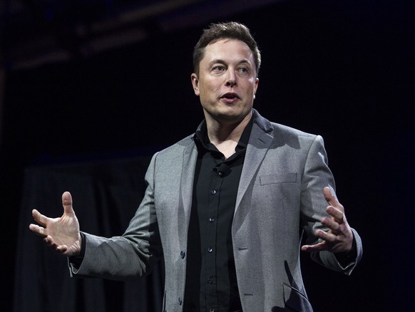 FILE - In this April 30, 2015, file photo, Tesla Motors CEO Elon Musk unveils the company&#039;s newest products, in Hawthorne, Calif. Tesla Inc. is riding high as it hosts its annual shareholders’ me ...