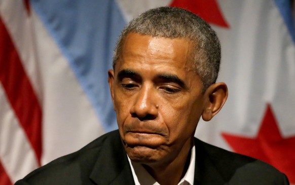 Former President Barack Obama pauses as he hosts a conversation on civic engagement and community organizing, Monday, April 24, 2017, at the University of Chicago in Chicago. It&#039;s the former pres ...