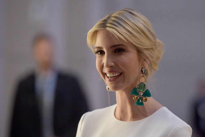 epa05927560 US President Trump&#039;s assistant and daughter Ivanka Trump wearing large earrings arrives at a Gala Dinner at Deutsche Bank within the framework of the W20 summit in Berlin, Germany, 25 ...