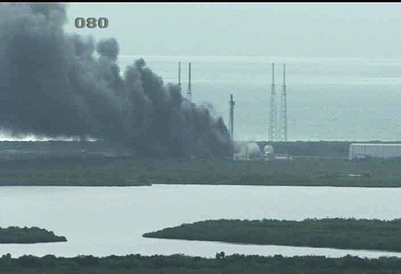 epa05518463 A handout image from a NASA live camera shows a fire burning on a launch pad after reports indicated that a SpaceX Falcon 9 rocket, which was scheduled to launch on 03 September, exploded  ...
