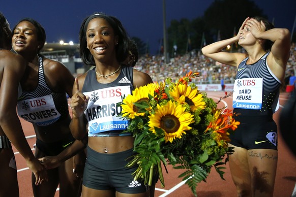 epa05510143 Kendra Harrison (C) from the USA, celebrates next to Clelia Rard-Reuse from Switzerland (R) after winning the women&#039;s 100m hurdles race at the Athletissima IAAF Diamond League interna ...