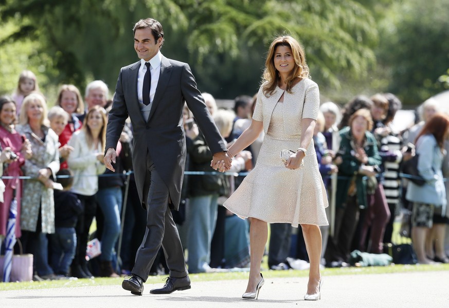 Swiss tennis player Roger Federer and his wife Mirka arrive at St Mark&#039;s Church in Englefield, England, ahead of the wedding of Pippa Middleton and James Matthews, Saturday, May 20, 2017. Middlet ...