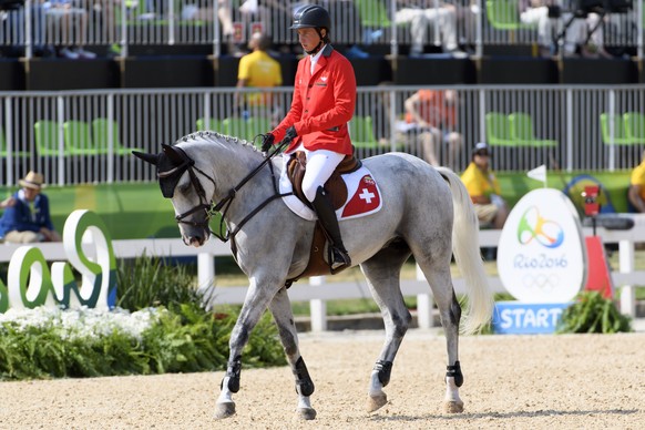 Martin Fuchs of Switzerland rides his horse Clooney during the Equestrian Jumping inidvidual final round A in the Olympic Equestrian Centre in Rio de Janeiro, Brazil, at the Rio 2016 Olympic Summer Ga ...