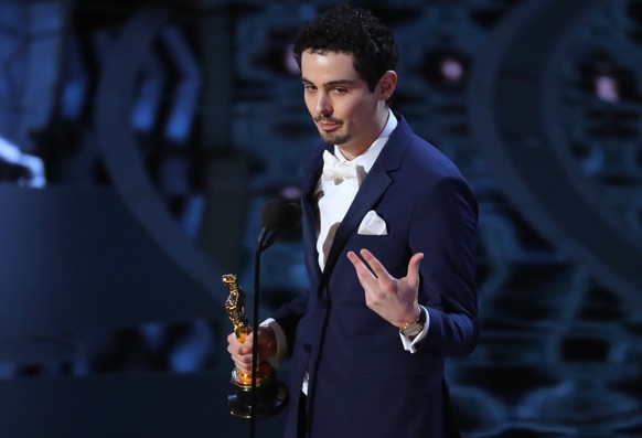 89th Academy Awards - Oscars Awards Show - Damien Chazelle accepts the award for winning Best Director. REUTERS/Lucy Nicholson