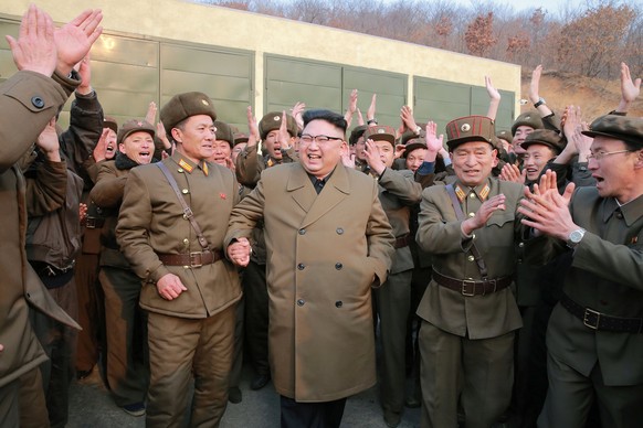 North Korean leader Kim Jong Un watched the ground jet test of a Korean-style high-thrust engine newly developed by the Academy of the National Defence Science in this undated picture provided by KCNA ...
