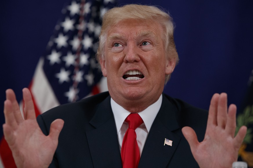 President Donald Trump speaks to reporters after a security briefing at Trump National Golf Club in Bedminster, N.J., Thursday, Aug. 10, 2017. (AP Photo/Evan Vucci)