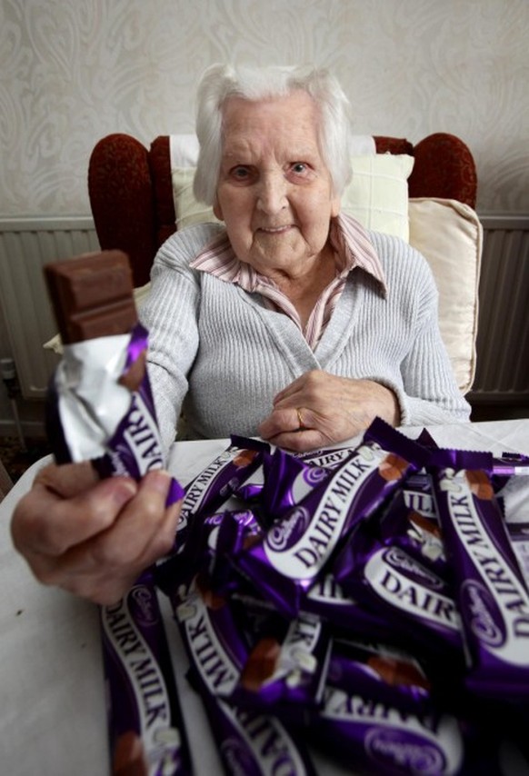 100-YEAR-OLD choc-a-holic Peggy Griffiths from North Devon 12 MAR 2009 See SWNS Story SWCHOCO Chocoholic Peggy Griffiths revealed the secret to her 100-years of good health yesterday eating 70,000 CHO ...