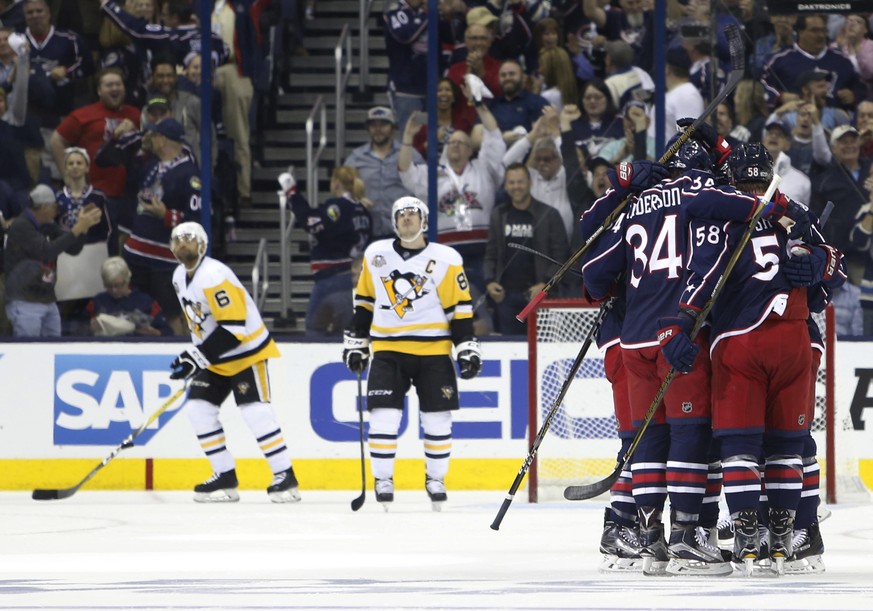 Columbus Blue Jackets celebrate a goal against the Pittsburgh Penguins during the first period of Game 4 of an NHL first-round hockey playoff series Tuesday, April 18, 2017, in Columbus, Ohio. (AP Pho ...