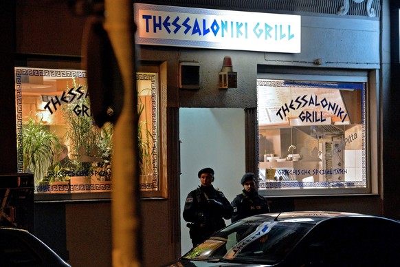 epaselect epa05839769 German police officers stand at restaurant where an arrest was made in Herne, Germany, 09 March 2017. After a manhunt, German police arrested one person believed to be 19-year-ol ...