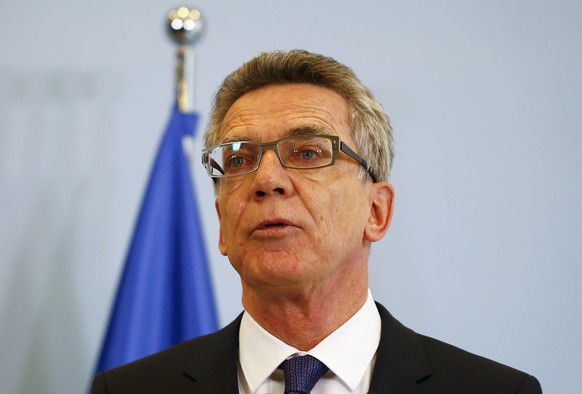 German Interior Minister Thomas de Maziere addresses a news conference at the interior ministry in Berlin, Germany, December 9, 2015. REUTERS/Pawel Kopczynski