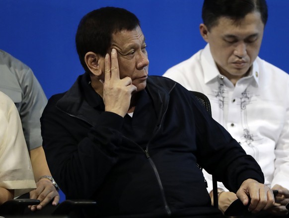 epa06171789 Filipino President Rodrigo Duterte listens during the 23rd anniversary of Technical Education and Skills Development Authority (TESDA) in Taguig city, south of Manila, Philippines, 30 Augu ...