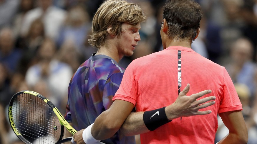 Rafael Nadal, of Spain, right, and Andrey Rublev, of Russia, greet one another after Nadal won their match during the quarterfinals of the U.S. Open tennis tournament, Wednesday, Sept. 6, 2017, in New ...