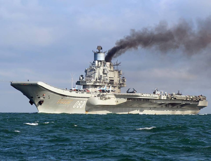 epa05596279 A handout photograph made available by Dover Marina.com on 21 October 2016 showing Russian aircraft carrier Admiral Kuznetsov in the English Channel, 21 October 2016. The Russian Task Grou ...