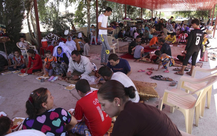 Angehörige der jesidischen Minderheit suchen Zuflucht in Dohuk, Nordirak.