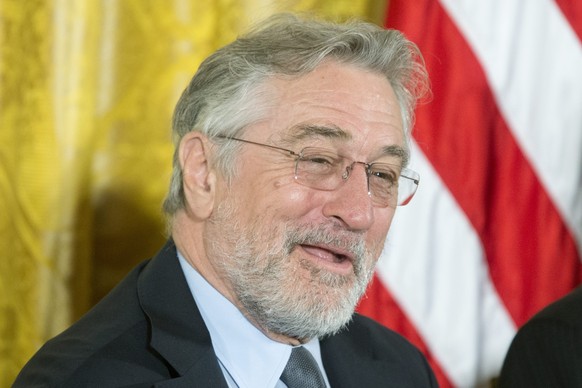 epa05643125 Actor Robert De Niro, recipient of the Presidential Medal of Freedom, attends a ceremony in which he was awarded the medal by US President Barack Obama, in the East Room of the White House ...